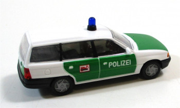 Rietze H0 1/87 PKW Opel Astra Kombi grün/weiß als Polizei  (66/08)