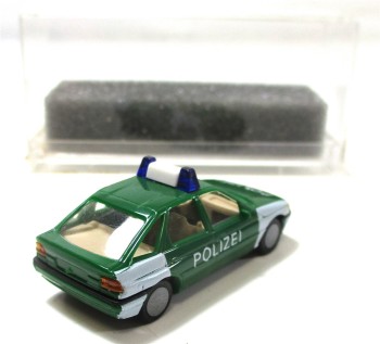Praline 1/87 Modellauto PKW 5714 Ford Escort Polizei OVP (46-20)