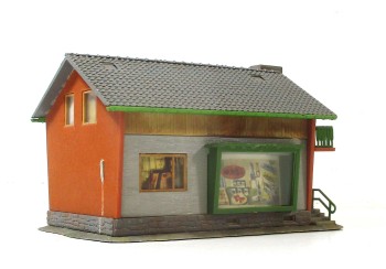 Fertigmodell H0 (6) Faller Siedlungshaus mit Terrasse und Kamin (H0-1054g)